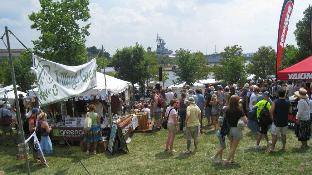 Overlook of a community event by the water