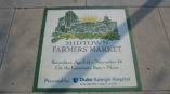 Midtown Farmers Market sign on a wall 2