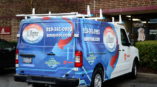 A Maynor graphic van wrap