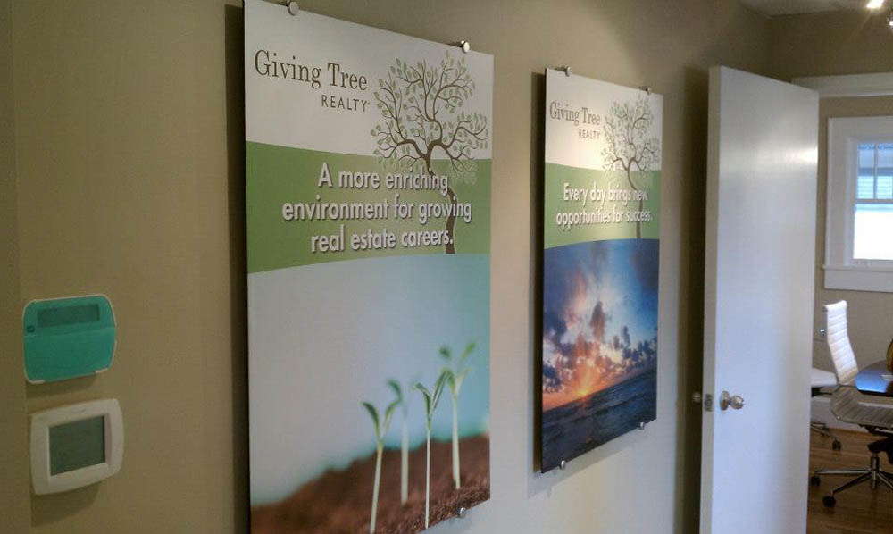 Giving Tree Realty wall advertisements