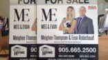 Meg & Evan Real Estate signage