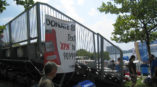 Poster encouraging donations to WXPN hanging on bleachers