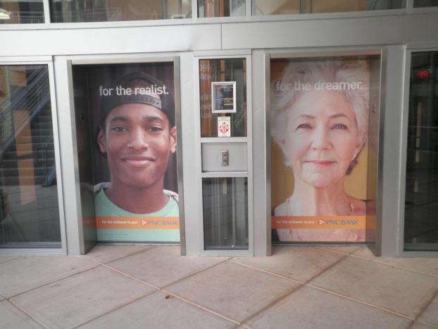 PNC Bank elevator wraps for the realist and for the dreamer