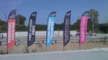 Personal training flag banners on the side of the road