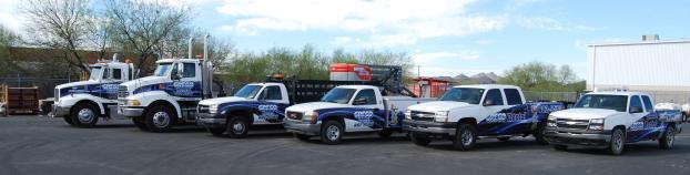 Fleet wrap including various sized trucks