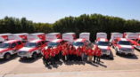 State Farm fleet wraps with staff standing in front outside