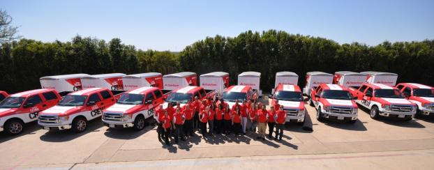 State Farm fleet wraps with staff standing in front outside