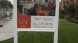 Liv Avenida tour today signage outside of houses