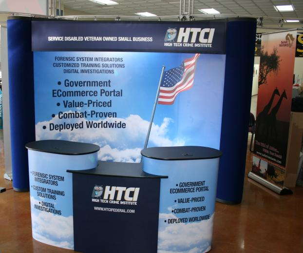 High Tech Crime Institute trade show display and tables