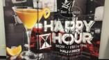 Bar Louie Happy Hour signage